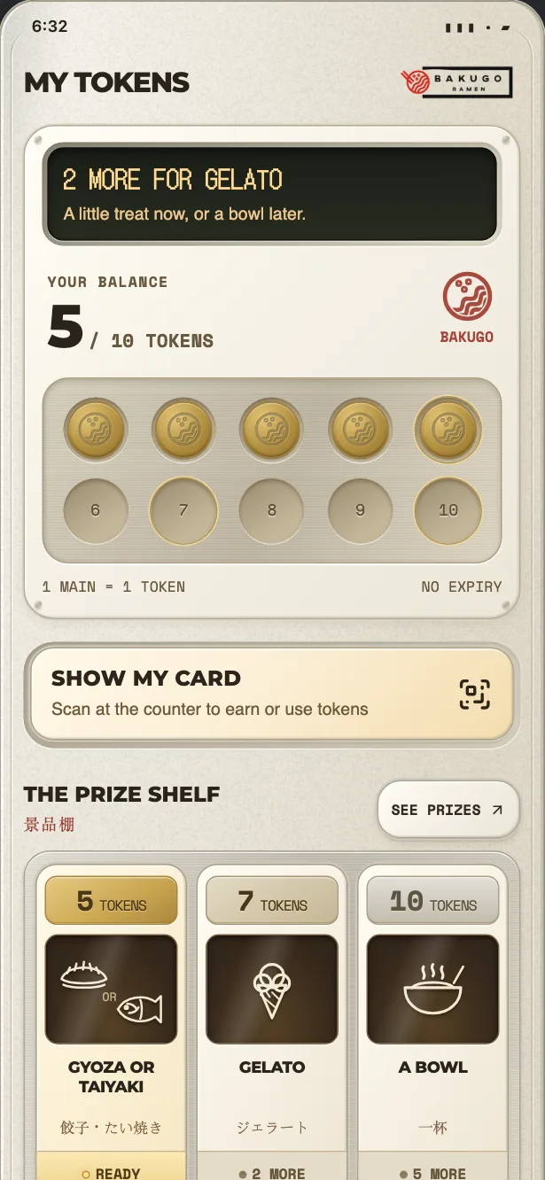 The app’s token card with five of ten tokens filled, the prize shelf below it